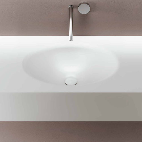 Eingebautes Waschbecken - SMOOTH - PLANIT - Corian® / mit integrierter Waschtischplatte / oval