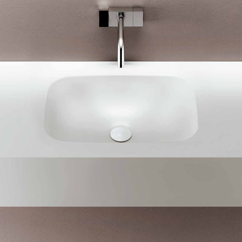 Eingebautes Waschbecken - STELLA - PLANIT - Corian® / mit integrierter Waschtischplatte / nach Maß