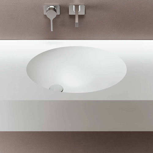 Eingebautes Waschbecken - SYMPHONY 6 - PLANIT - Corian® / mit integrierter Waschtischplatte / oval