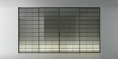 Tür für Innenbereich - SOHO - RIMADESIO - Nussbaum / Aluminium / Schiebe