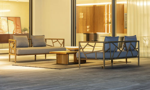 Modernes Sofa - AURA - FISCHER MÖBEL - für Außenbereich / Sunbrella® / mit Armlehnen