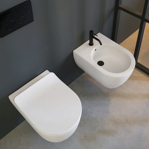 Wandhängendes Bidet - GLAM - Scarabeo Ceramiche - emaillierte Keramik / Keramik