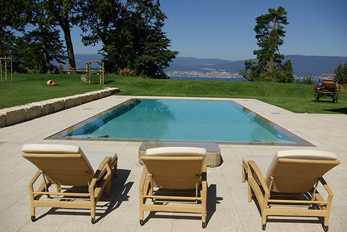 Schwimmbecken für Außenbereich - SUISSE - PISCINES CARRE BLEU - erdverlegt / Beton / Endlos