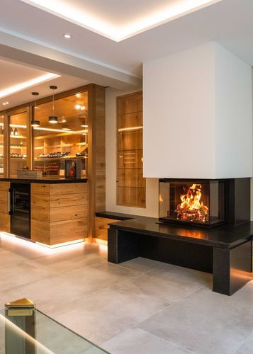 Holzkamin - RAS - Rüegg Cheminée Schweiz AG - Einbau / 3-Seiten / geschlossene Feuerstelle