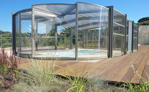 Hohe Schwimmbadüberdachung - ROTUNDA - ABRISUD - teleskopisch / Edelstahl / mit manueller Bedienung