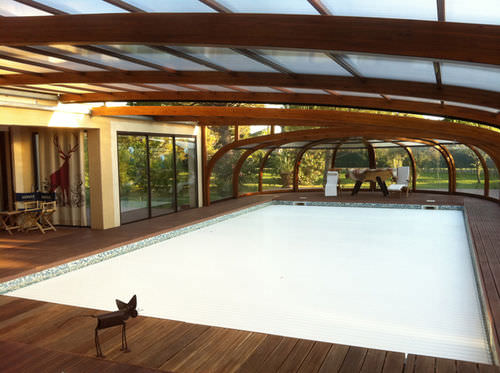 Schwimmbadüberdachung für Wandmontage - ABRISUD - Holz / mit manueller Bedienung