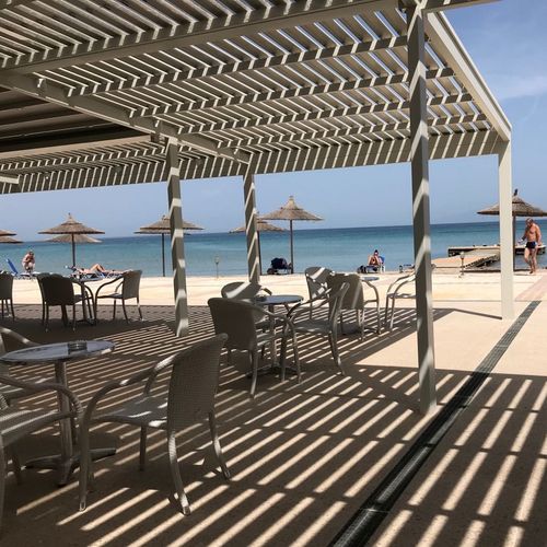 Selbsttragende Pergola - COSPILOUVRE - COSPICON  SA - angebaut / Aluminium / Polycarbonat-Überdachungen
