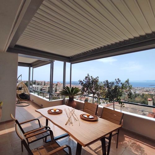 Angebaute Pergola - COSPICON  SA - Aluminium / mit orientierbaren Lamellen / mit Sonnenschutzlamellen