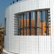 Betonmauer - ECOSISM TECHNOLOGY - ECOSISM ADVANCED BUILDING TECHNOLOGY - galvanisiertem Stahl / Fertigbau / mit integrierter Dämmung