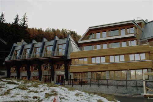 Fertigbau-Gebäude - JOLLY - Riko Hiše - Massivholz / Beton / Holzkonstruktion