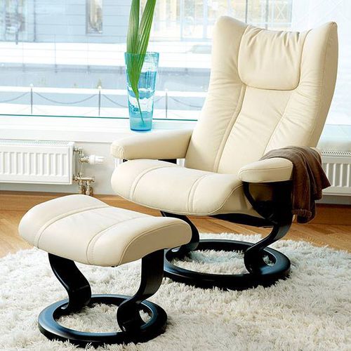 Moderner Sessel - WING - Ekornes - Leder / Holz / mit Fußstütze