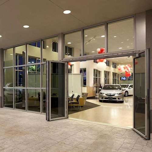 Schiebe-Stapel-Terrassentür - SL73 - NanaWall - faltbar / Aluminiumstruktur / mit Doppelverglasung