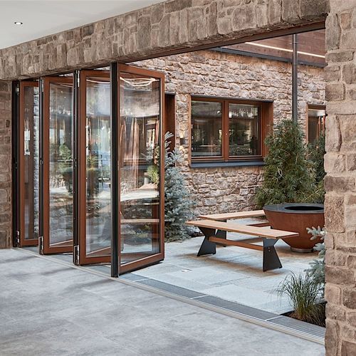 Schiebe-Stapel-Terrassentür - NW 540 - NanaWall - faltbar / mit Holzstruktur / mit Doppelverglasung