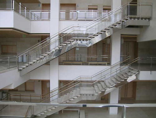Gerade Treppe - 24602 - Couturier Iron Craft - Steinstufen / mit Metallstruktur / für Geschäftsgebäude