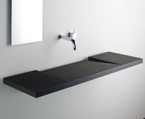 Wand-Waschbecken - GEO  - Omvivo - Stein / mit integrierter Waschtischplatte / rechteckig