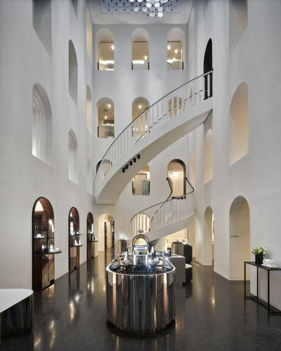 High-End-Treppe - EeStairs - viertelgewendelt / Steinstufen / mit Stahlstruktur