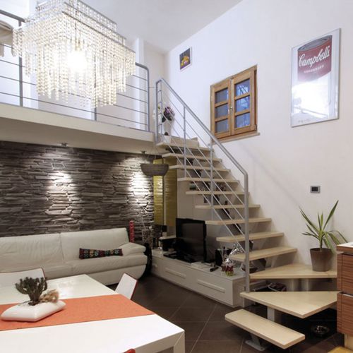 Viertelgewendelte Treppe - GERANIO B - New Living srl - Holzstufen / mit Stahlstruktur / modern