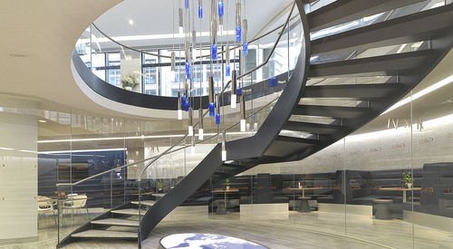 Spindeltreppe - JONES DAY - elite metalcraft - Holzstufen / mit Stahlstruktur / modern