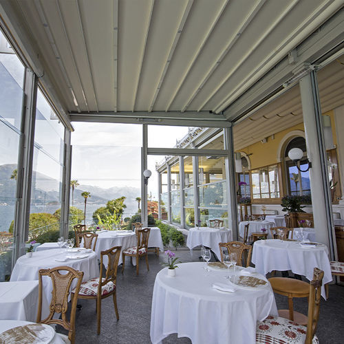 Angebaute Pergola - T1 - KE Outdoor Design - selbsttragend / Aluminium / mit Stoffüberdachung
