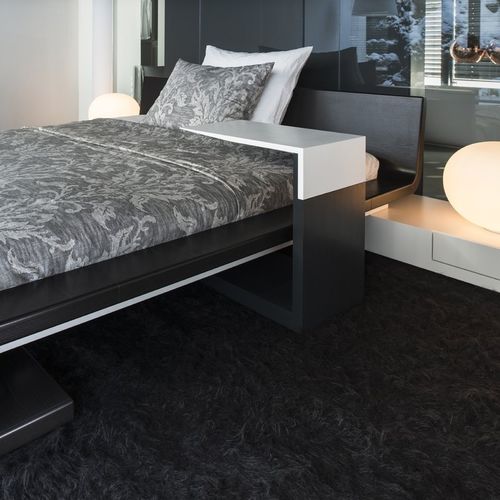 Moderner Beistelltisch - SLIDER - Steininger Designers - Corian® / Gestell aus Massivholz / Gestell aus Melamin