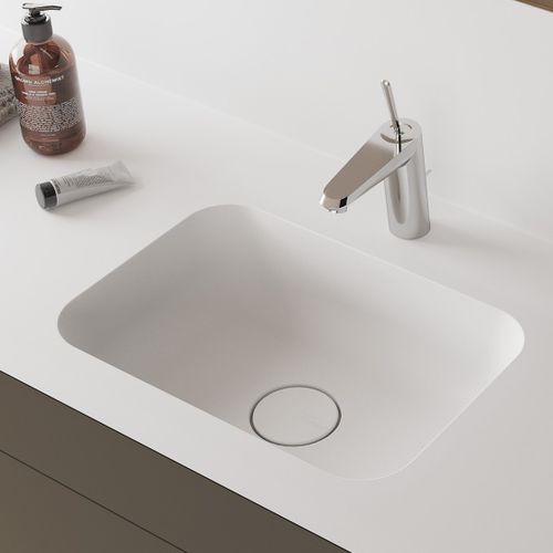 Einbauwaschbecken - DUPONT - Hasenkopf - Corian® / mit integrierter Waschtischplatte / Mischbatterie