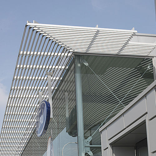 Aluminium-Sonnenschutzlamelle - DUCOSUN ELLIPS INTERMEDIATE - Duco - für Fassaden / horizontal / motorisiert