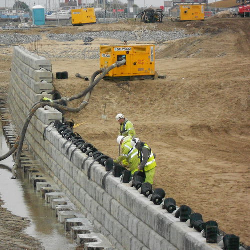 Beton-Stützmauer - REDI-ROCK™  - CPM Group Ltd  - modular / auf bewehrter Erde / für Kanalisationen