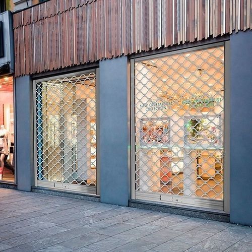 Rolltor aus Metall / für Einzelhandel - FLEXIDOOR SA