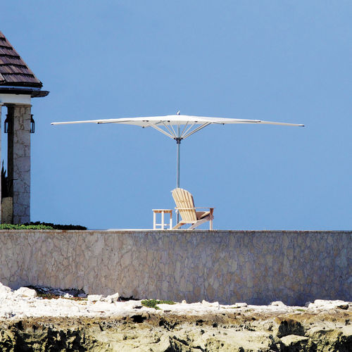Quadratischer Sonnenschirm - OCEAN MASTER MAX ZERO HORIZON - TUUCI - achteckig / mit Zentralmast / Stoff