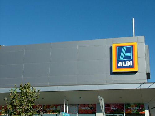 Paneel-Fassadenverkleidung - ALDI STORES - VITRAPANEL - Vitragroup - Faserzement / Hochglanz