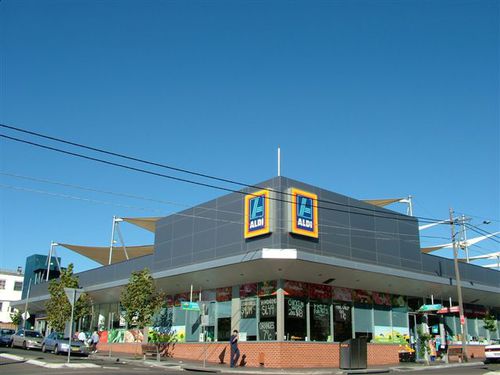 Paneel-Fassadenverkleidung - ALDI LAKEMBA - Vitragroup - Faserzement / Hochglanz