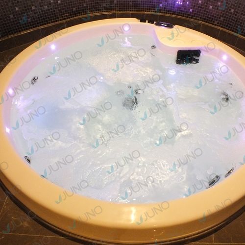 Hot-Tub-Schwimmbecken / Einbau - Juno SPA Design & Manufacture - gewinkelt / Viersitzer / Verbundwerkstoff