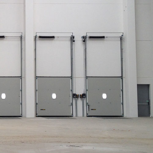 Sektionales Industrietor - VERTICAL LINTEL - KOPRON - Metall / automatisch / wärmeisoliert