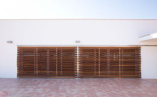 Tür zur Außenaufstellung - PIRBA - Holz / Edelstahl / Schiebe
