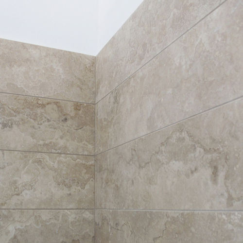 Travertin-Natursteinplatte - CASO - Arredo di Pietra srl - für Wand / für Innenausbau / poliert