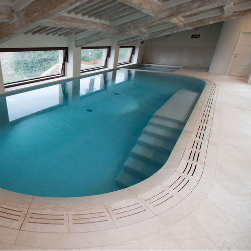 Schwimmbecken / andere Formen - Arredo di Pietra srl - integrierter Rand / für den Innenraum / erdverlegt