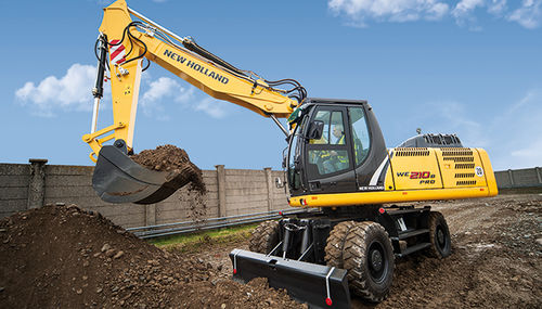 Mittelgroßer Bagger - WE 210B PRO - New Holland Construction - mit Gummireifen / Multifunktion / für Baustelle