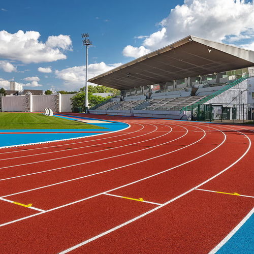 Sportboden für Außenbereich - TARTAN GOLD - Polytan GmbH - aus PU / Polyurethan / für Sportanlage