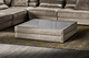 moderner Couchtisch / Glas / Bronze / Leder