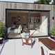 Verbundwerkstoff-Terrassentür / Aluminiumstruktur / mit Dreifachverglasung / dreiflügelig