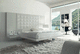 Doppelbett / modern / mit integriertem Nachttisch / Leder