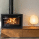 Holz-Kaminofen / freistehend / Zentral / minimalistisches Design