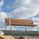 moderne Bank für den öffentlichen Raum / Holz / Stahl / mit Rückenlehne