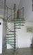 Wendeltreppe / schrägverzahnt / Glasstufen / mit Edelstahlstruktur