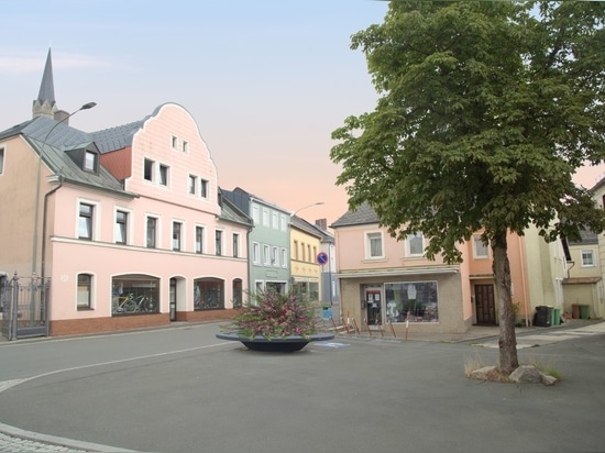 Urbane Eleganz in Monochrom: Überdimensionale Pflanzgefäße für moderne Stadtlandschaften