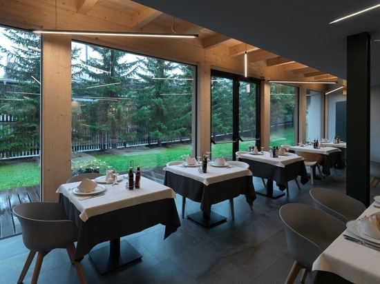 Hotel Fedora: ein Beispiel für alpine Architektur unter Verwendung von Feinsteinzeug