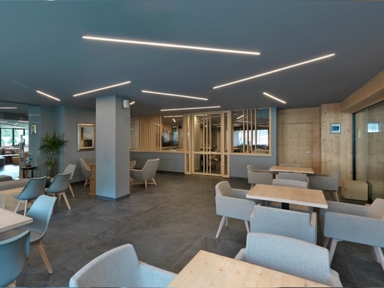 Hotel Fedora: ein Beispiel für alpine Architektur unter Verwendung von Feinsteinzeug